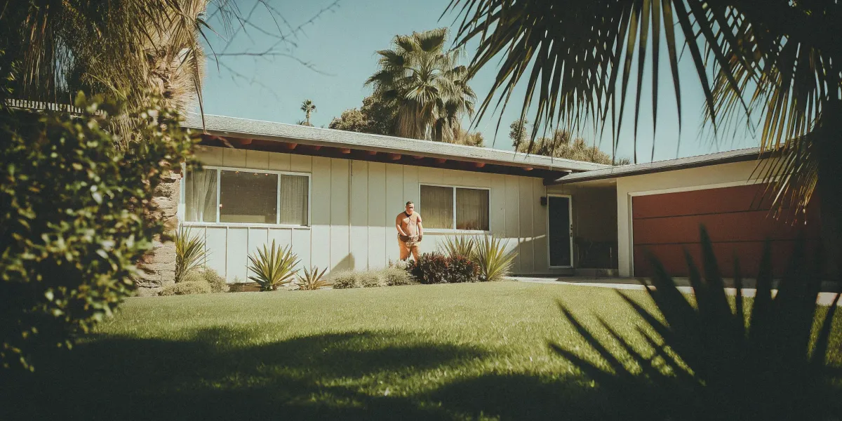 A modern home with fire-resistant landscaping, a factor in the cost to fire proof a house.