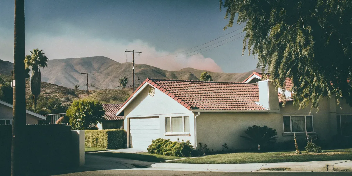 A home near a hillside getting its free wildfire risk score by address.