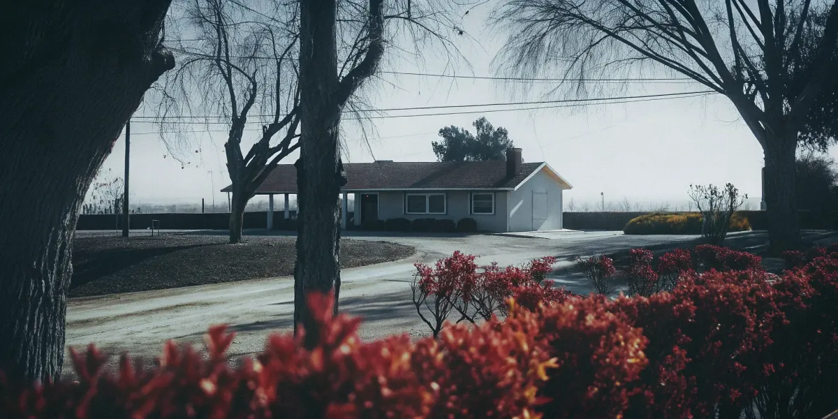 Kern County home with a cleared defensible space meeting fire clearance requirements.