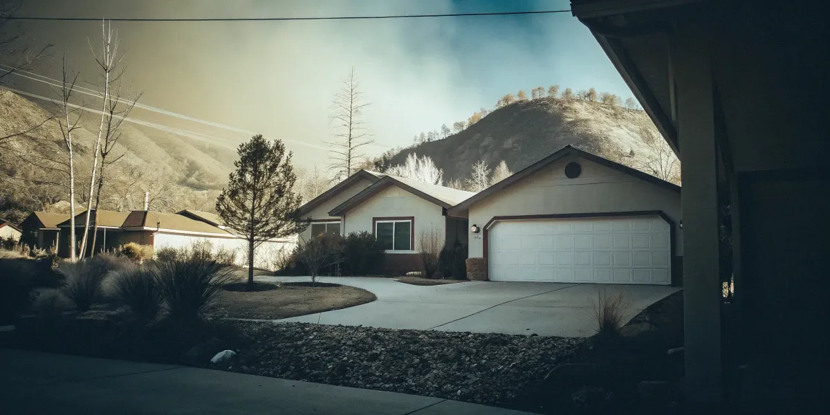 A home with clear defensible space, a key factor for a good property wildfire risk score.