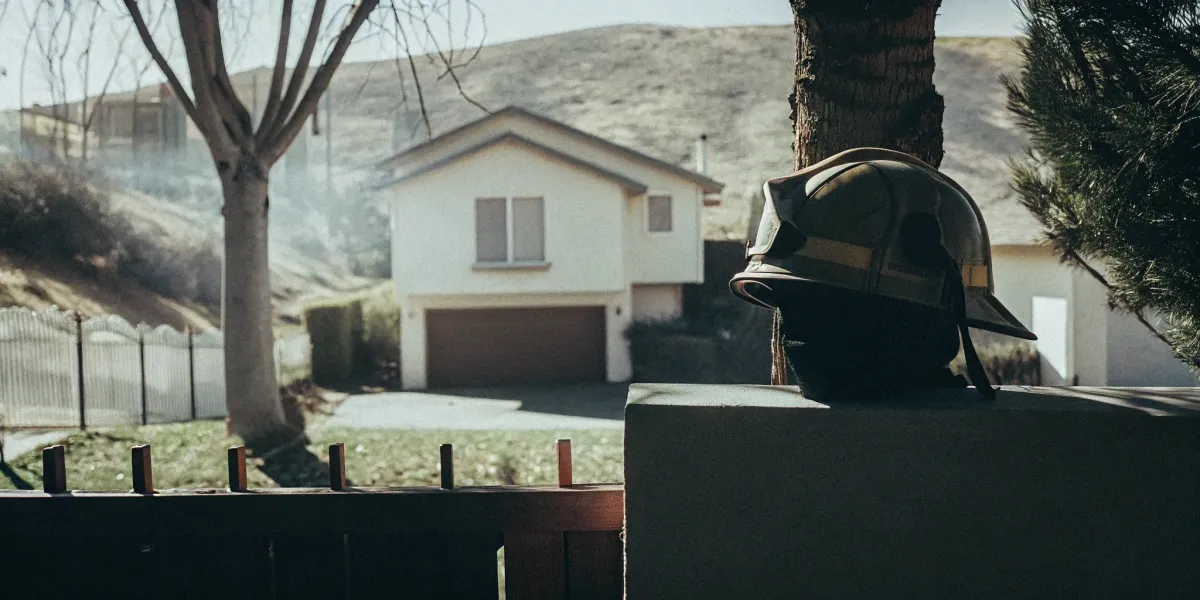 A home in a high brush area, a primary concern for high-risk insurance companies.