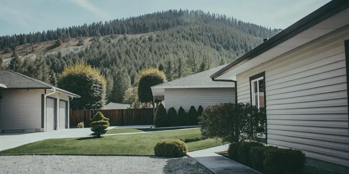 A home's landscaped yard creating defensible space across the three home ignition zones.