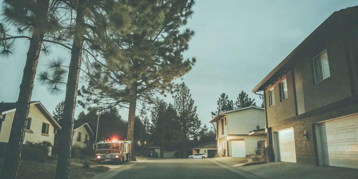 A fire truck in a high-risk California neighborhood requiring FAIR Plan insurance.
