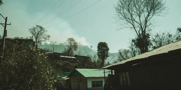 A home's proximity to dry hills and vegetation is how a wildfire risk score is calculated.