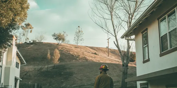 LA County brush clearance inspection near homes.