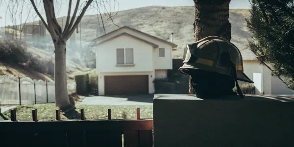 A home in a high brush area, a primary concern for high-risk insurance companies.